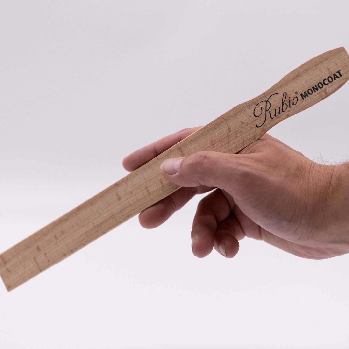Wooden stirring stick.